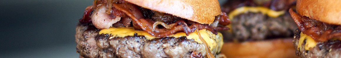Eating American (Traditional) Burger at Cheeburger Cheeburger restaurant in Bluffton, SC.
